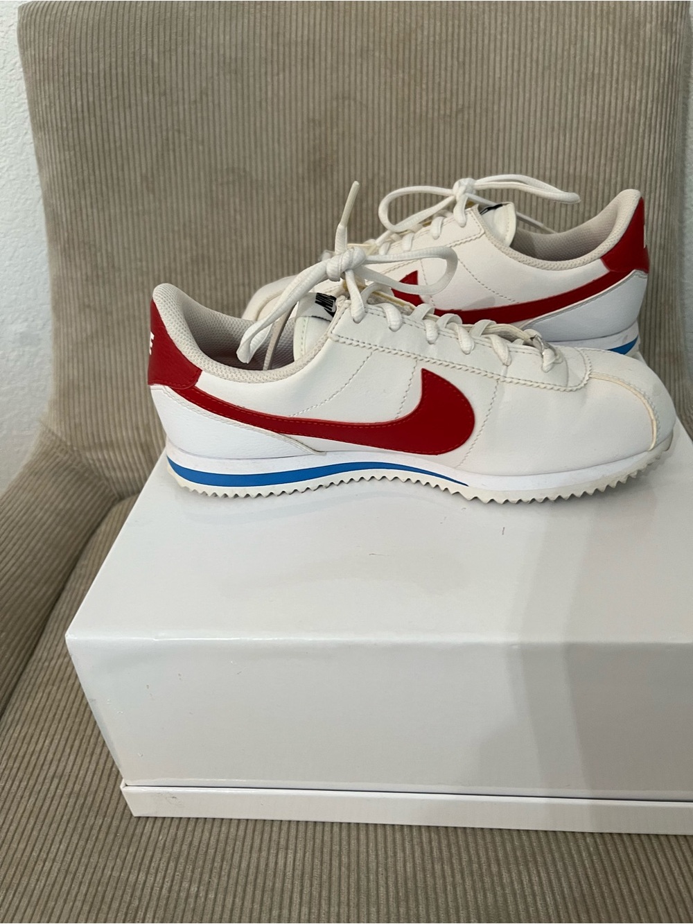 Nike White Sneakers with Red Swoosh and Blue Midsole Stripe - Picture 2 of 3